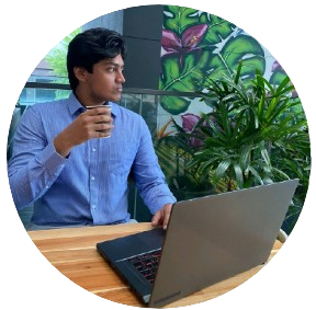 A man in a alice blue shirt with a thinking expression